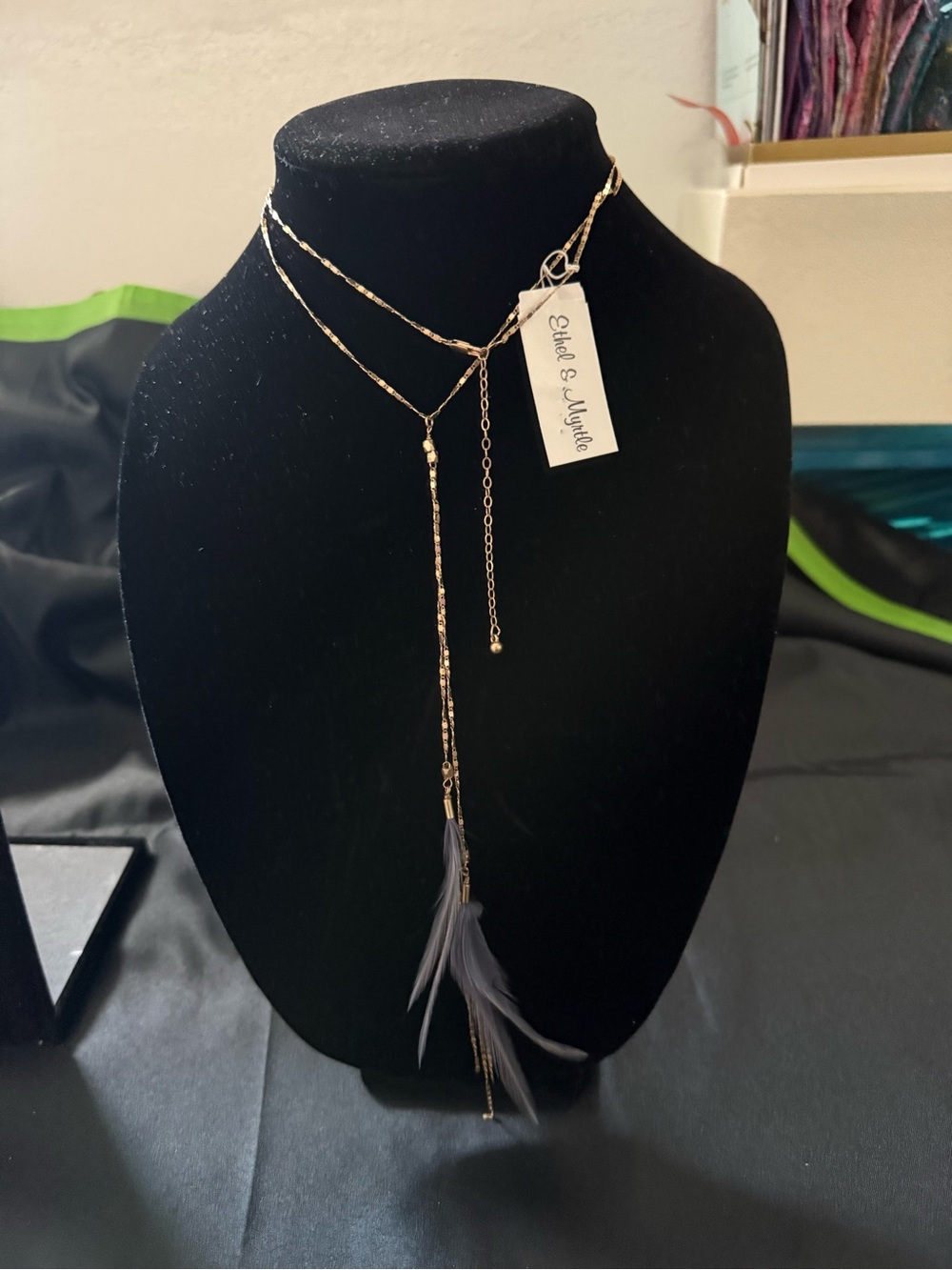 Gold Y-Lariat Necklace with Dark Blue Feather Tassel and two sets of earrings